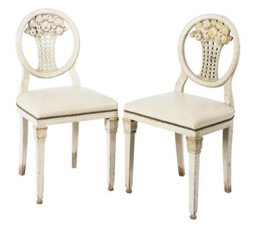 A SET OF FOUR SIDE CHAIRS WITH BASKET CARVED FRUIT SPLATS,