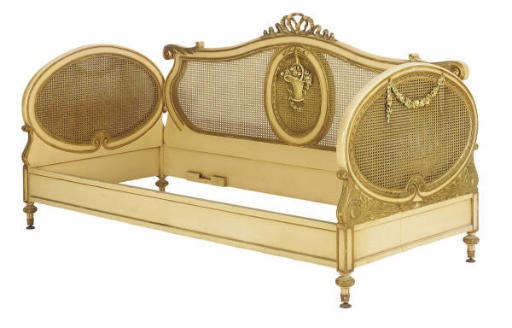A FRENCH CARVED AND POLYCHROME PAINTED DAYBED,