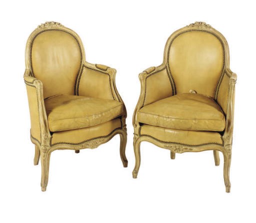 A PAIR OF FRENCH BEECHWOOD LEATHER UPHOLSTERED BERGERES,