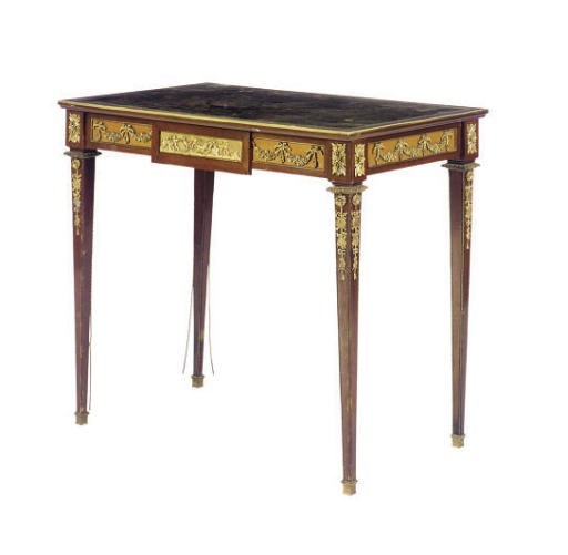 A FRENCH GILT-METAL MOUNTED MAHOGANY WRITING TABLE,