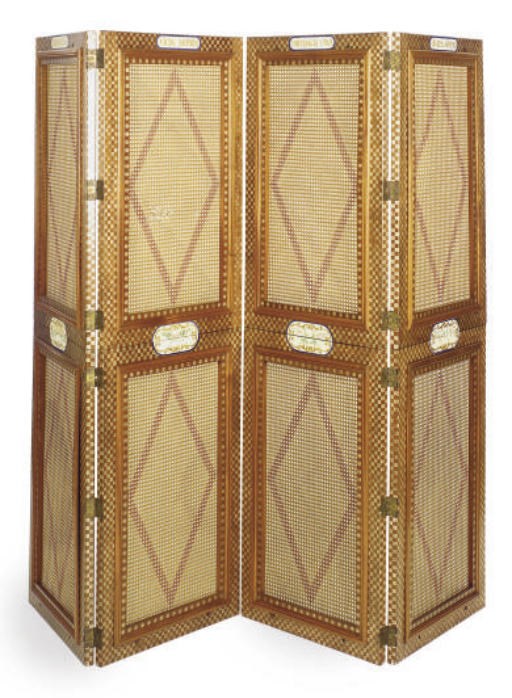 A POLYCHROME PAINTED CANED WALNUT FOUR PANEL SCREEN,