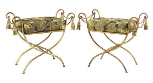 A PAIR OF PARCEL-GILT WROUGHT IRON BENCHES,