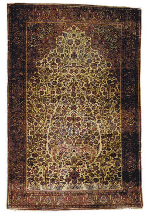 A SILK KASHAN RUG,