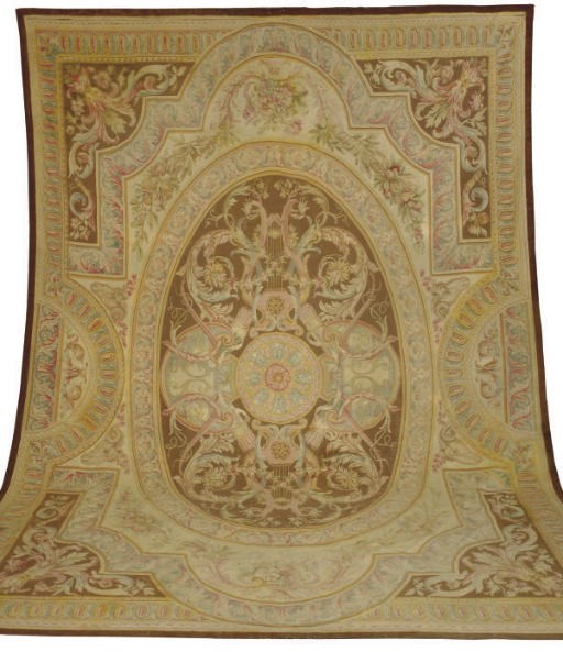AN AUBUSSON CARPET,