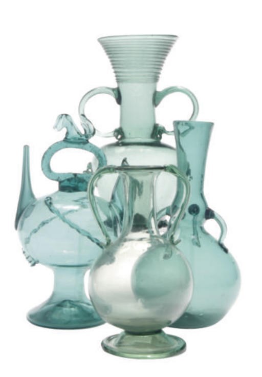 A GROUP OF CONTINTENTAL GREEN GLASS TABLEWARES,