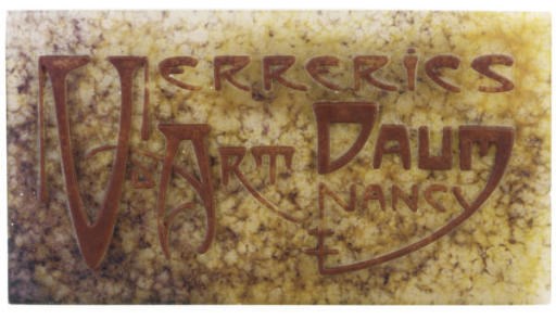 A FRENCH PATE-DE-VERRE TRADE SIGN,