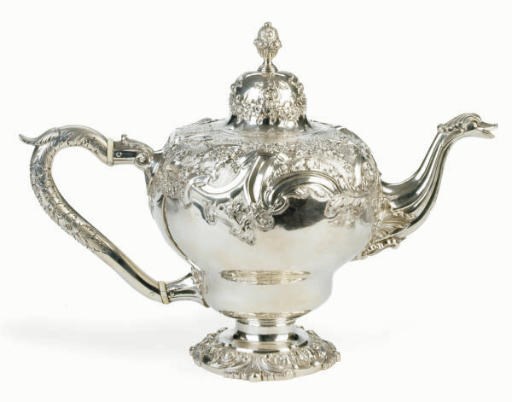 A PORTUGUESE SILVER TEAPOT**,