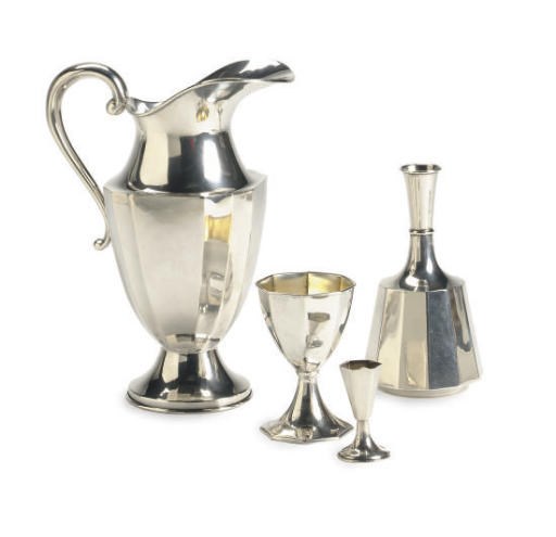 AN AMERICAN SILVER PART DRINKING SET,