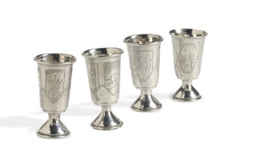 A SET OF TWELVE RUSSIAN SILVER FOOTED CORDIAL CUPS,