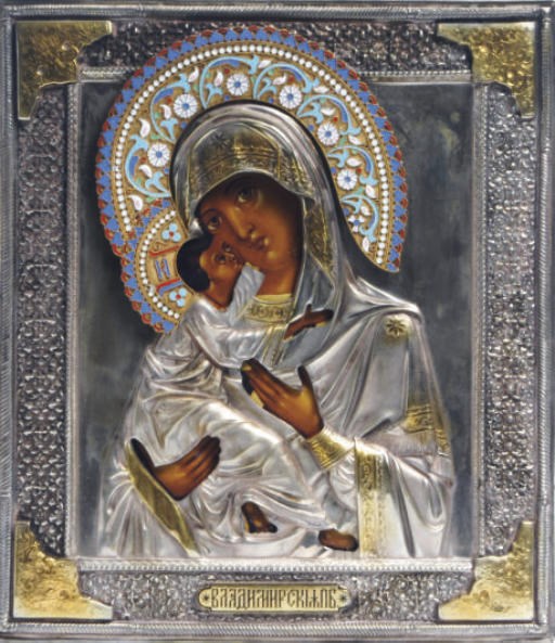 TWO RUSSIAN SILVERED-METAL, CLOISONNÉ ENAMEL AND WOOD PANEL ICONS DEPICTING THE MOTHER OF GOD,