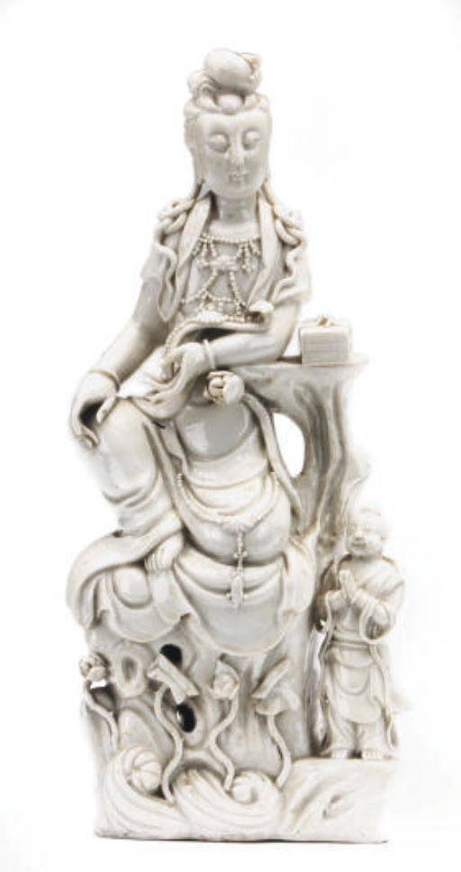 A CHINESE BLANC-DE-CHINE GUANYIN AND ACOLYTE,