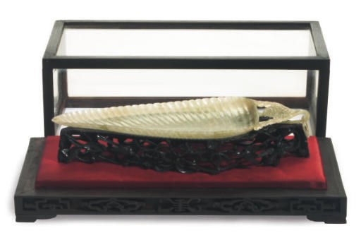 A CHINESE GREY-GREEN JADEITE LEAF-FORM DISH,