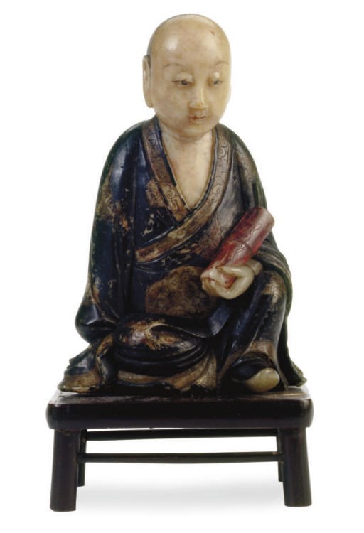 A SMALL PAINTED SOAPSTONE FIGURE OF A LUOHAN,
