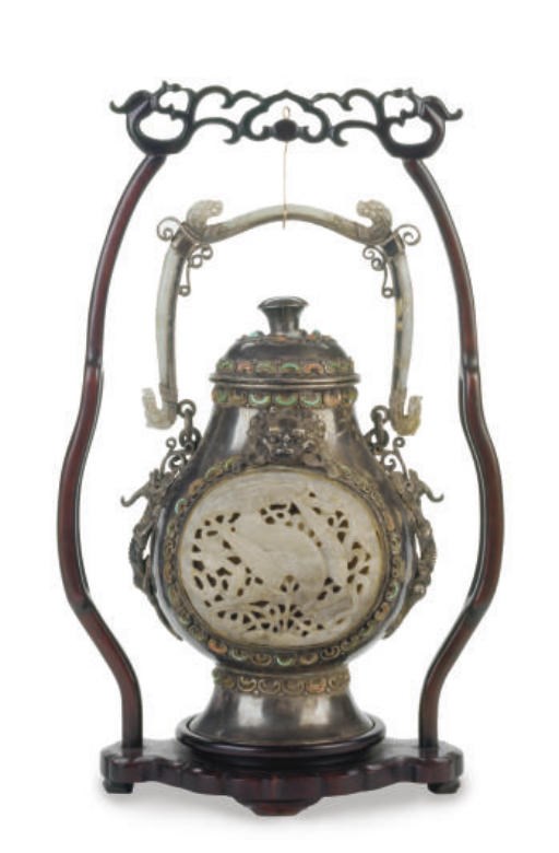 A TIBETO-CHINESE INLAID JADE, CORAL, AND TURQUOISE-EMBELLISHED SILVER VASE AND COVER**,