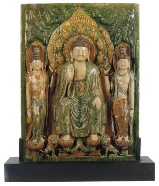 A LARGE CHINESE GREEN AND AMBER-GLAZED RED POTTERY BUDDHIST PLAQUE,