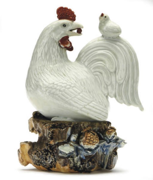 A JAPANESE ARITAWARE PORCELAIN HEN AND CHICK GROUP,