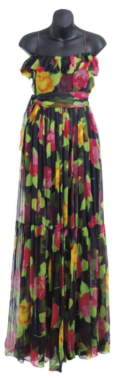 A NAVY BLUE AND MULTI-COLORED FLORAL PRINT CHIFFON EVENING GOWN,