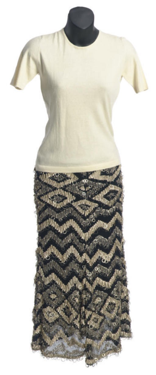 A CREAM AND BLACK TWO-PIECE ENSEMBLE,