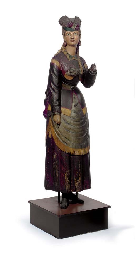 A CARVED AND PAINT-DECORATED 'LADY OF FASHION' TRADE FIGURE