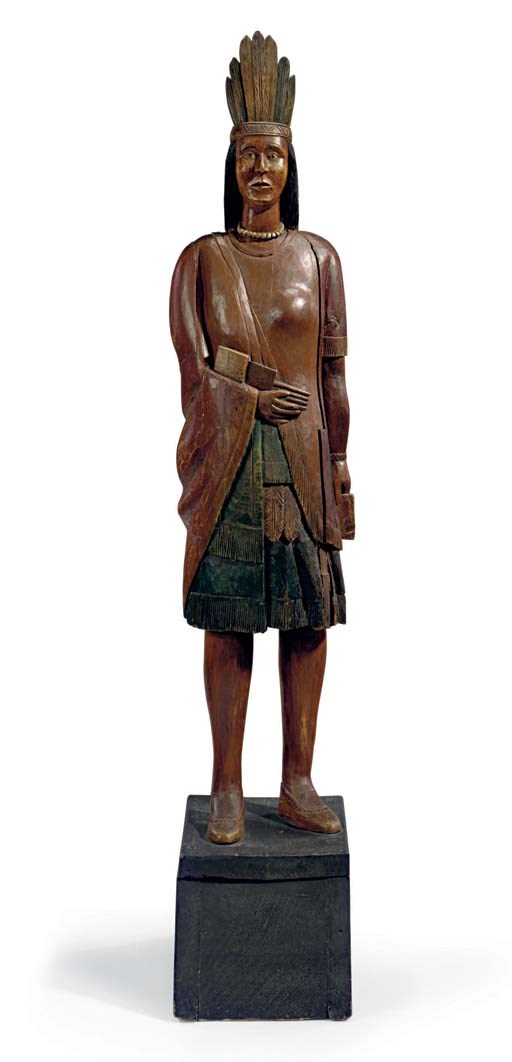 A CARVED AND PAINT-DECORATED INDIAN TOBACCONIST FIGURE