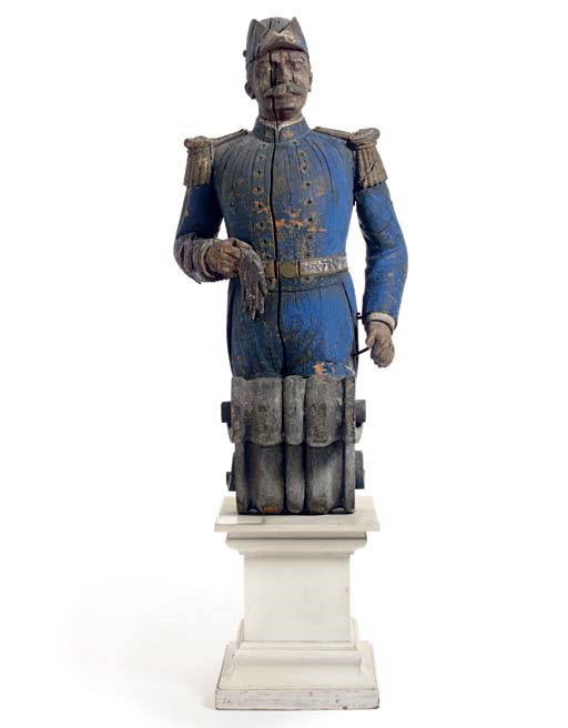 A CARVED AND PAINTED TRADE FIGURE OF ADMIRAL GEORGE DEWEY