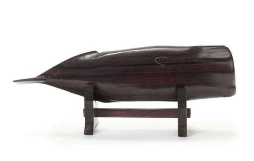 A NATIVE AMERICAN CARVED WOOD WHALE