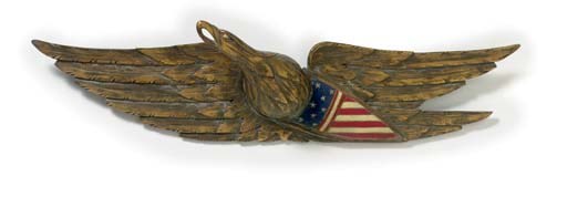 A CARVED AND PAINTED PINE SPREADWING EAGLE