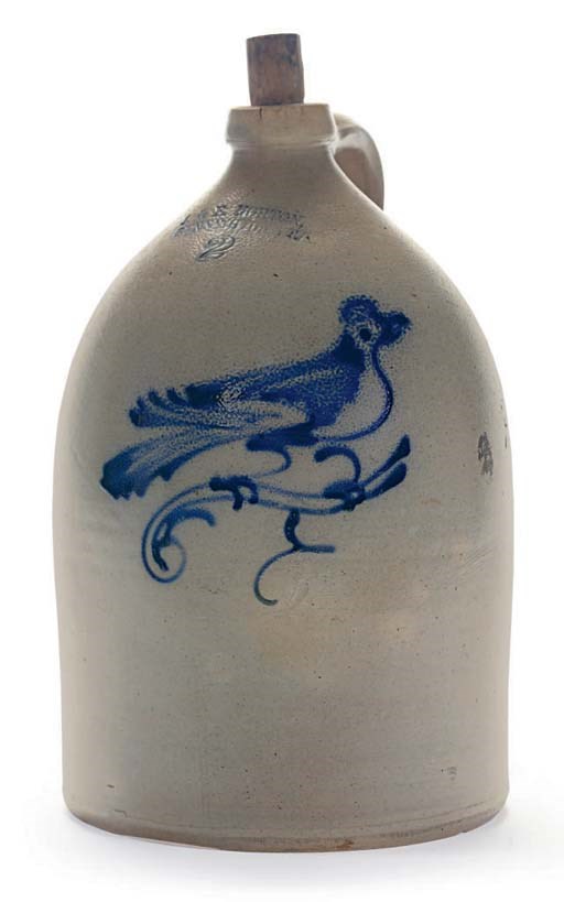 A STONEWARE JUG WITH COBALT DECORATION OF A BIRD