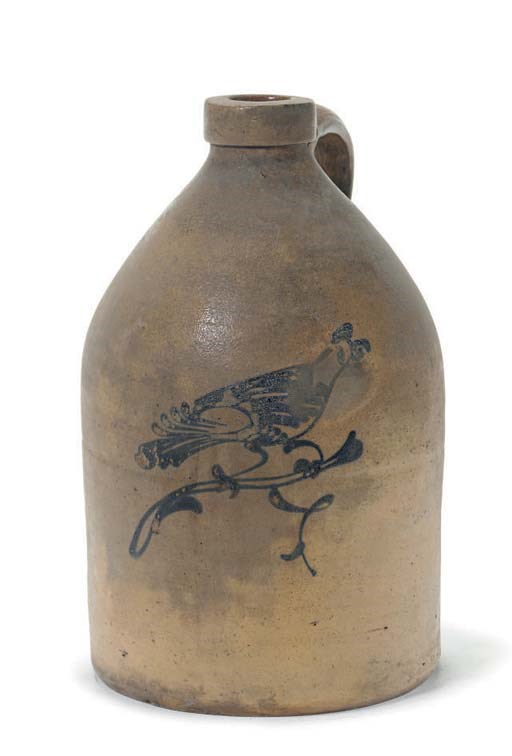 A STONEWARE JUG WITH BIRD DECORATION