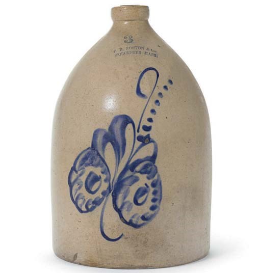 A STONEWARE THREE GALLON JUG WITH FLORAL DECORATION