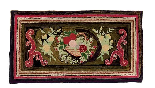 A COTTON AND WOOL HOOKED RUG