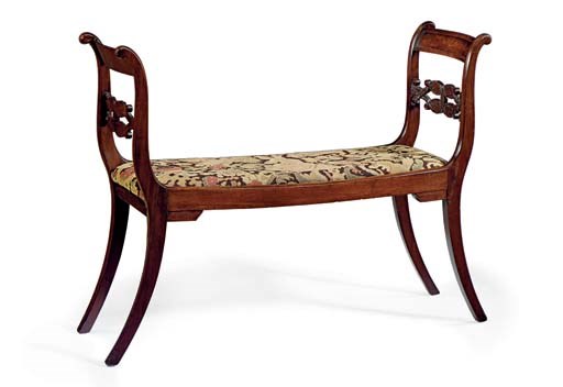 A CLASSICAL CARVED MAHOGANY WINDOW SEAT