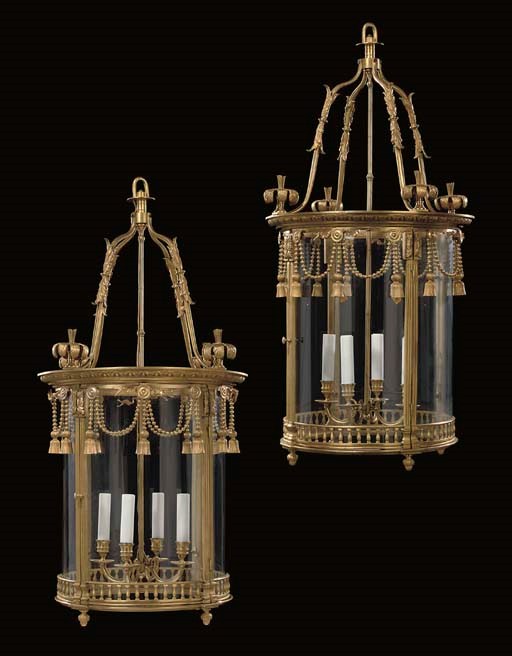 A PAIR OF LOUIS XVI STYLE ORMOLU HALL LANTERNS