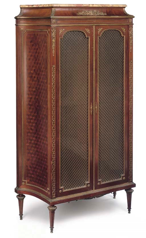 A LOUIS XVI STYLE ORMOLU-MOUNTED MAHOGANY AND PARQUETRY BIBLIOTHEQUE