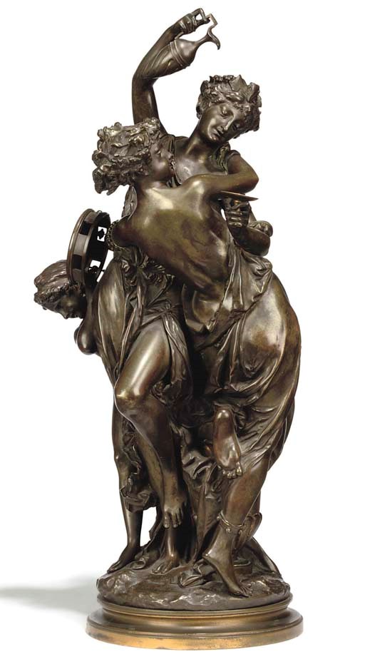 A FRENCH BRONZE GROUP OF TWO BACCHANTES AND PAN