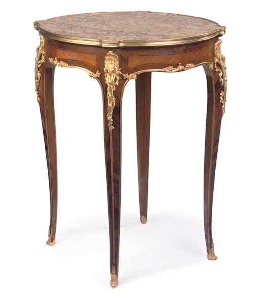 A LOUIS XV STYLE ORMOLU-MOUNTED TULIPWOOD AND MAHOGANY GUERIDON