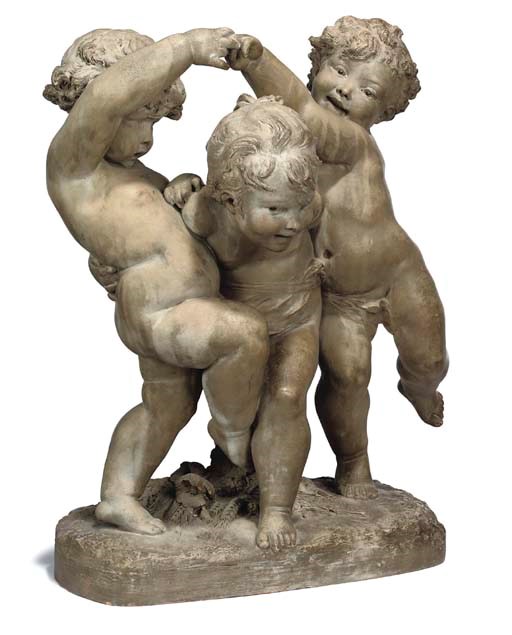 A FRENCH PAINTED TERRACOTTA GROUP OF THREE PLAYFUL PUTTI
