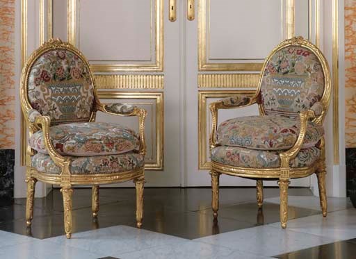 A PAIR OF LOUIS XVI STYLE GILTWOOD FAUTEUILS