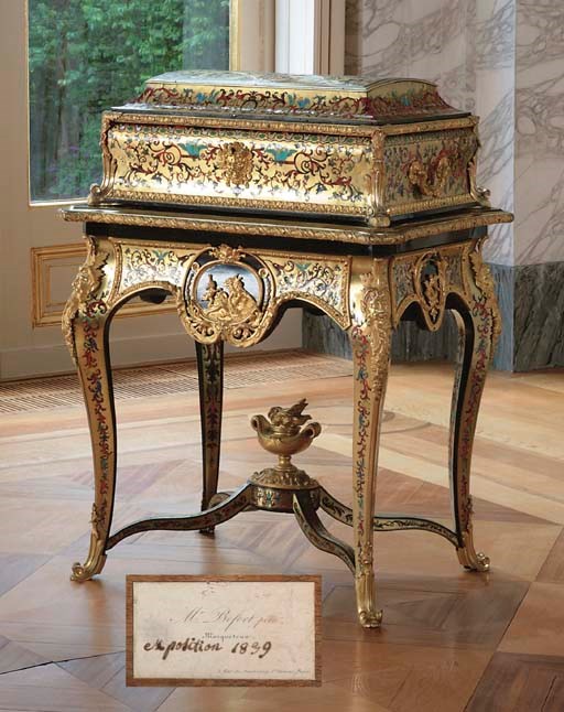 A LOUIS-PHILIPPE ORMOLU-MOUNTED, CUT-BRASS, PEWTER, MOTHER-OF-PEARL AND RED AND STAINED TORTOISESHELL-INLAID EBONY AND EBONISED 'BOULLE' COFFRE DE MARIAGE