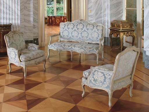 A MATCHED LOUIS XV STYLE PARCEL-GILT AND GREY-PAINTED THREE-PIECE SALON SUITE