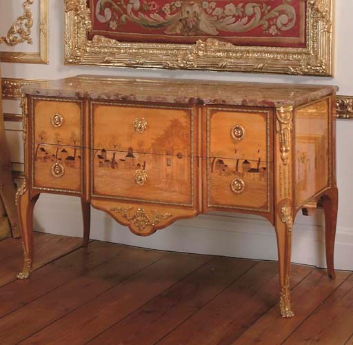 A TRANSITIONAL STYLE ORMOLU-MOUNTED CITRONNIER, TULIPWOOD AND MARQUETRY COMMODE