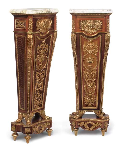 A MATCHED PAIR OF LOUIS XVI STYLE ORMOLU-MOUNTED MAHOGANY AND PARQUETRY PEDESTALS