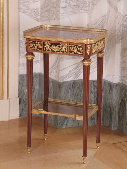A LOUIS XVI STYLE ORMOLU-MOUNTED MAHOGANY OCCASIONAL TABLE