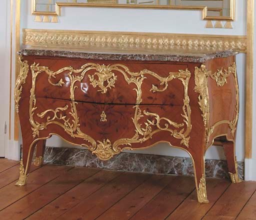 A LOUIS XV STYLE ORMOLU-MOUNTED MAHOGANY AND MARQUETRY COMMODE