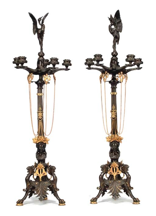 A PAIR OF NEO-GREC PARCEL-GILT BRONZE FIVE-LIGHT CANDELABRA