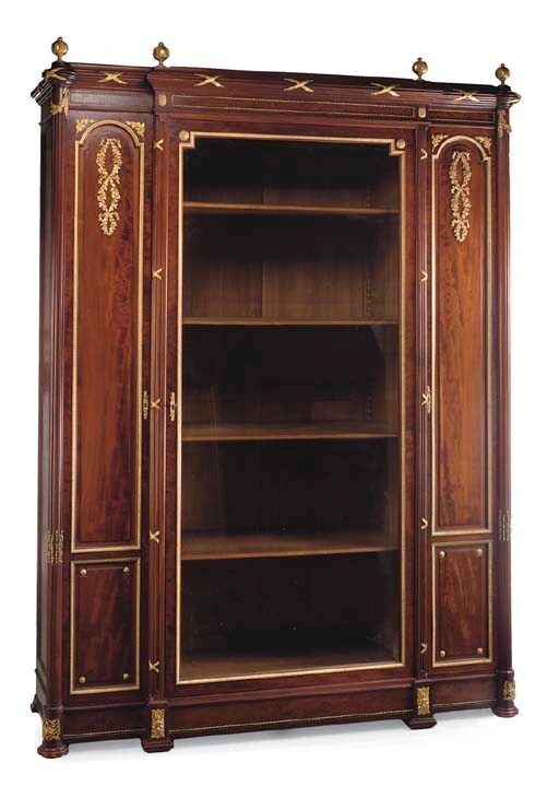 A LOUIS XVI STYLE ORMOLU-MOUNTED MAHOGANY BREAKFRONT VITRINE-CABINET