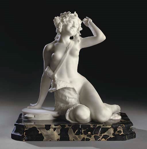 AN ITALIAN MARBLE FIGURE OF A SEATED BACCHANTE