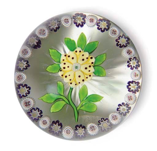 A BACCARAT GARLANDED FLOWER WEIGHT