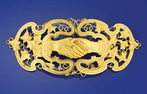 AN EARLY 20TH CENTURY 18CT. GOLD BUCKLE