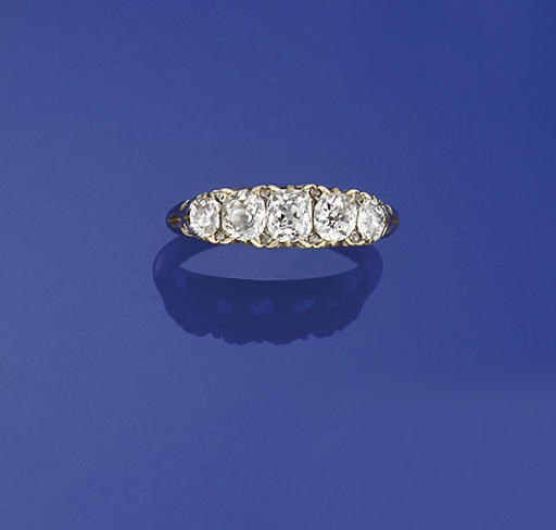 A LATE 19TH CENTURY DIAMOND FIVE STONE RING